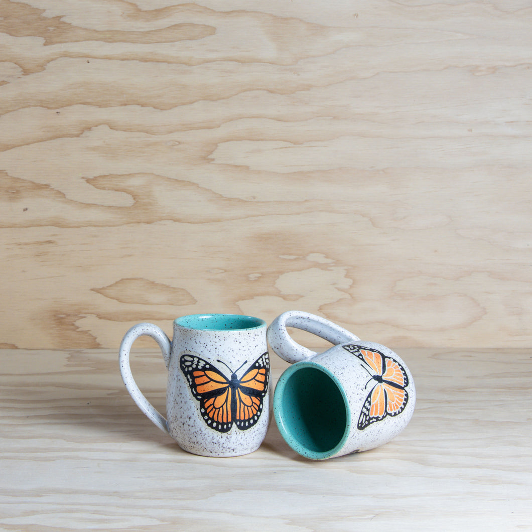 A Monarch butterfly Ceramic Mug